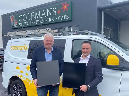 Two men pictured in front of a company branded vehicle with Colemans signage behind.