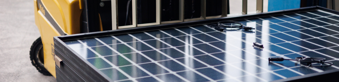 Close-up perspective shot of solar panel modules.